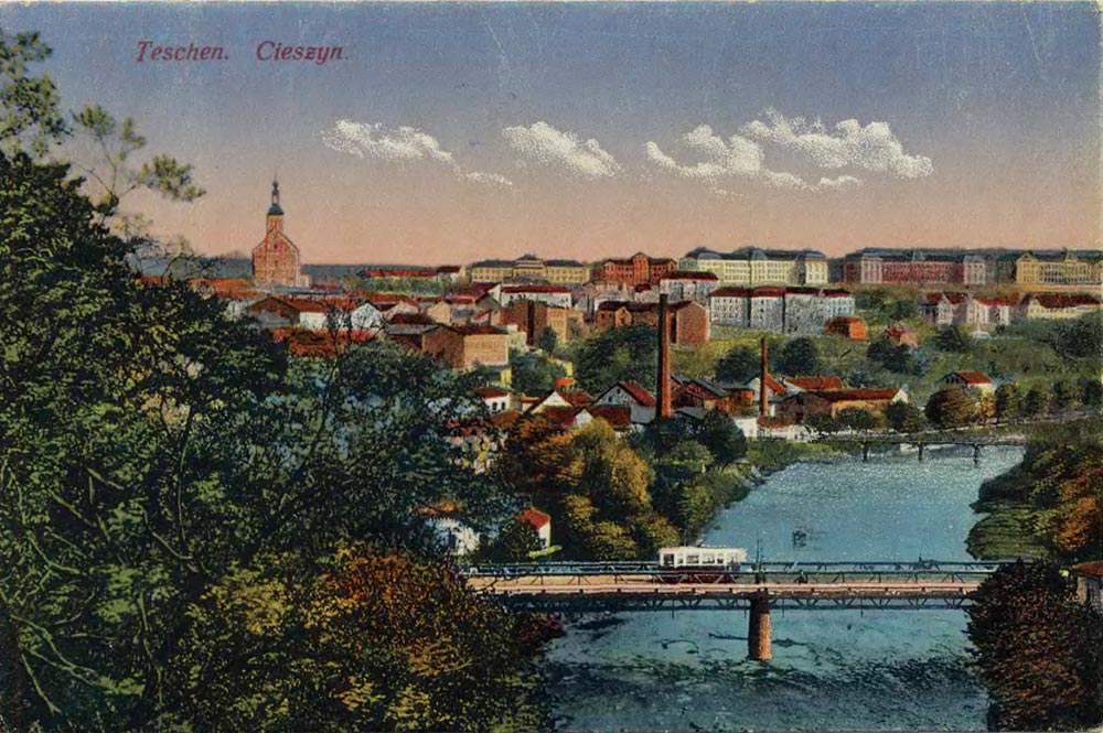 Panorama showing a tram on the river bridge over the River Olza. Circa 1919